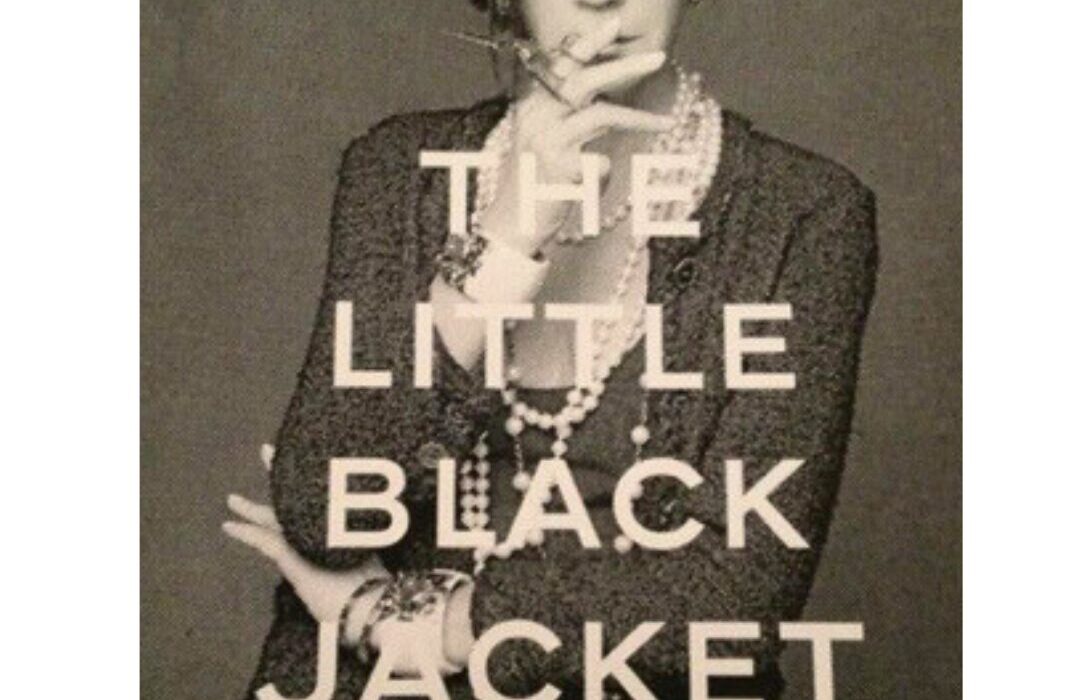 Front cover of "The Little Black Jacket" book. Carine Roitfeld is featured, posing like Coco Chanel.